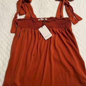 Rust color green envelope top size M